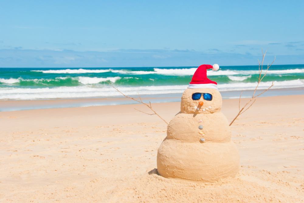 Snowman on holidays made out of sand instead of snow
