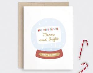 holiday card with snowglobe