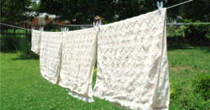 pink and white towels on clothesline