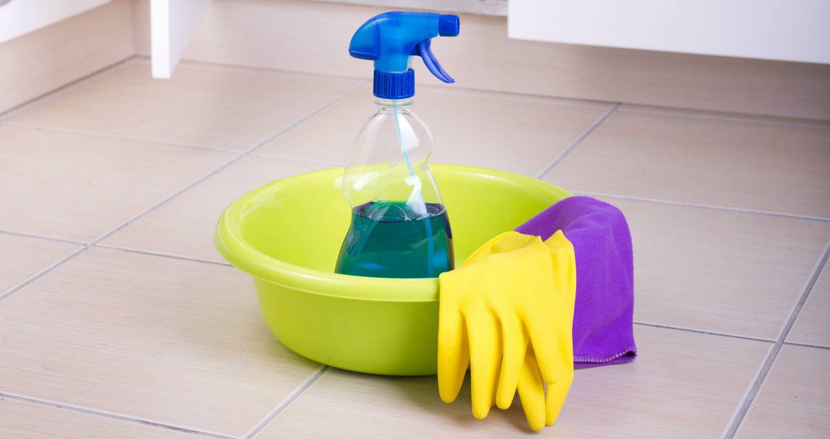 cleaning supplies on floor