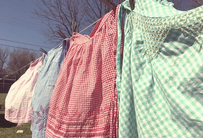 vintage aprons on a clothesline