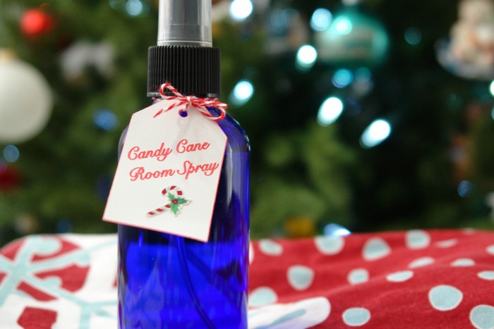 blue spray bottle in front of Christmas tree