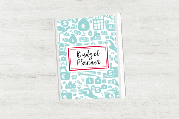 budget planner on white wooden table