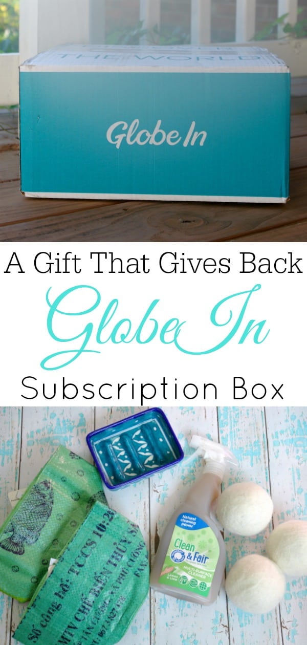 GlobeIn box on porch and contents on white and aqua wooden background
