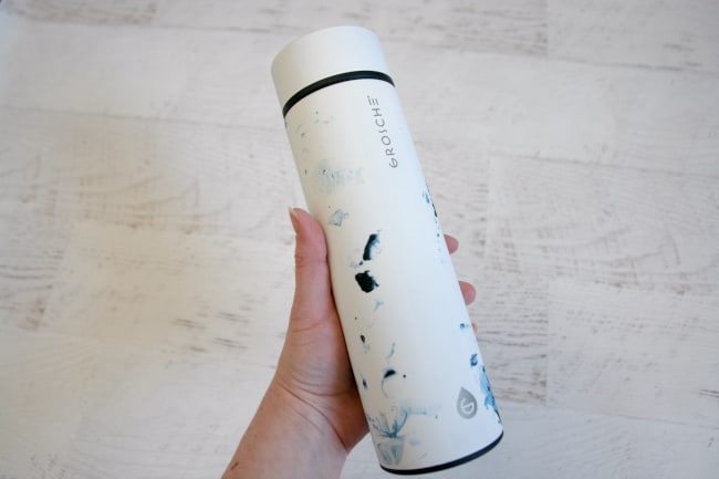 holding insulated water bottle