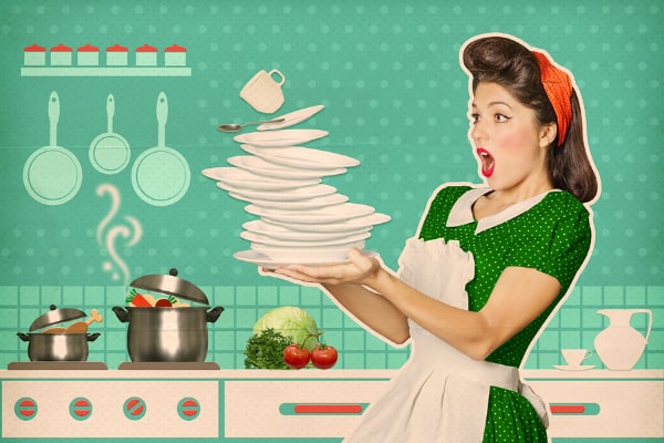 clumsy housewife dropping plates in kitchen