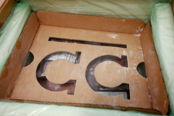 inside Crowd Cow box, logo in cardboard