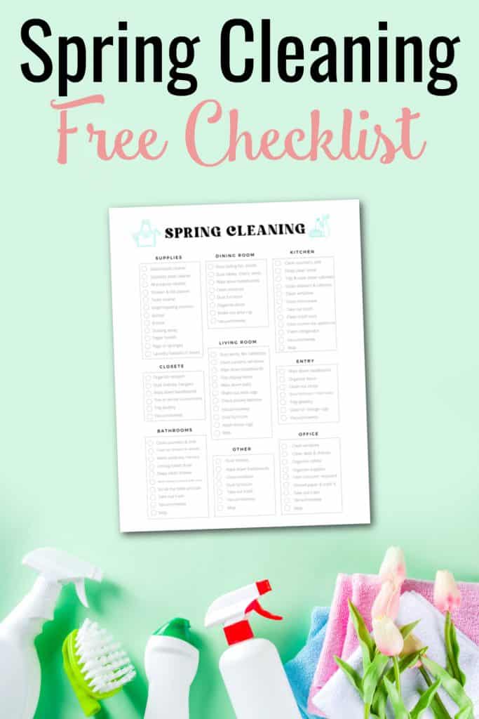 cleaning supplies and pink tulips on green background with spring cleaning checklist