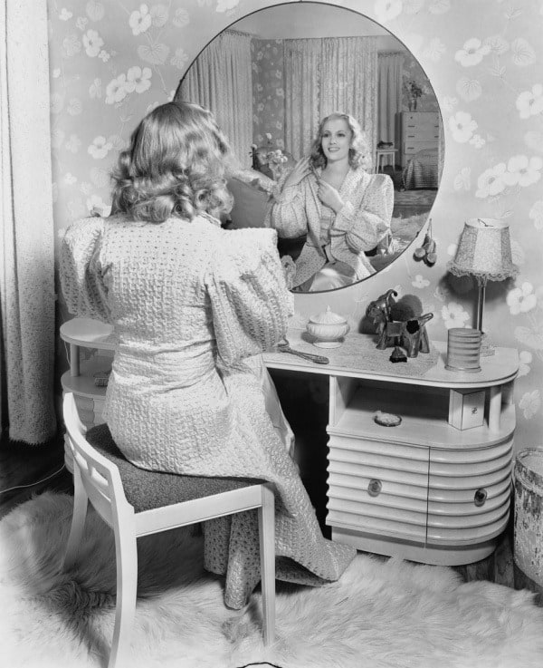 retro woman brushing hair