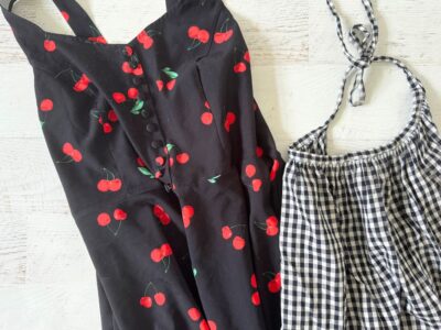 black cherry print dress with black and white gingham apron
